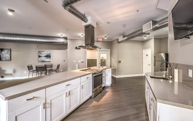 a kitchen with white cabinets